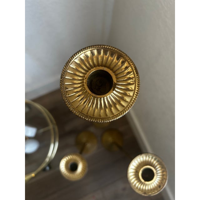 Set of 3 vintage, brass, Bombay Company, tall floor candle holders from India. They measure approx 31", 25" and 19.5"....