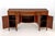 American Federal Figured Mahogany Sideboard, the bowfront top with single pull-out surface, central frieze drawer above...