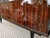 A truly spectacular and grand French sideboard from the 1960s, beautifully veneered in exotic Macassar ebony. This...