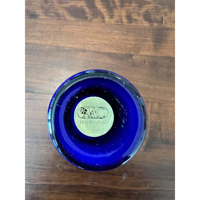 Tall cobalt blue glass cylinder vase by AAC Handcrafted, with a thick clear glass base. Original AAC Handcrafted label on...