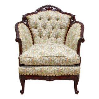 Antique French Louis XV Style Bergère Armchair – Hand-Carved Mahogany, Tufted Floral Upholstery, C. Late 19th Century For Sale