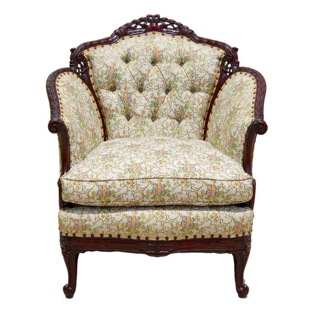 Antique French Louis XV Style Bergère Armchair – Hand-Carved Mahogany, Tufted Floral Upholstery, C. Late 19th Century For Sale