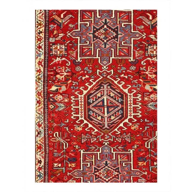 Original Persian Karajeh antique rug. The piece is made of hand-spun lamb's wool on a cotton foundation, and vegetable...