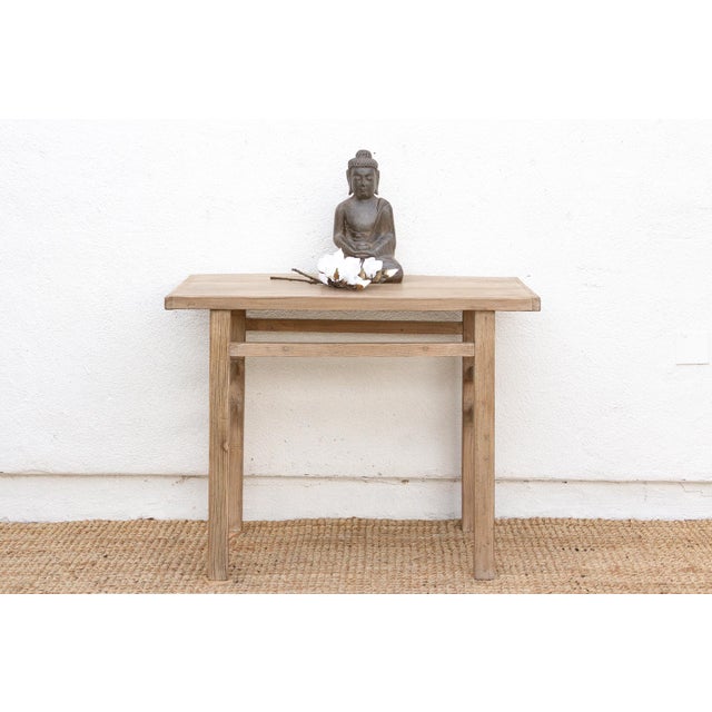 This is a piece where form meets spirit. Reconstructed from old wood, this altar console table carries with it the quiet...