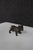 Sterling silver figurine depicting a standing English bulldog. The sculpture features detailed facial folds, a broad...
