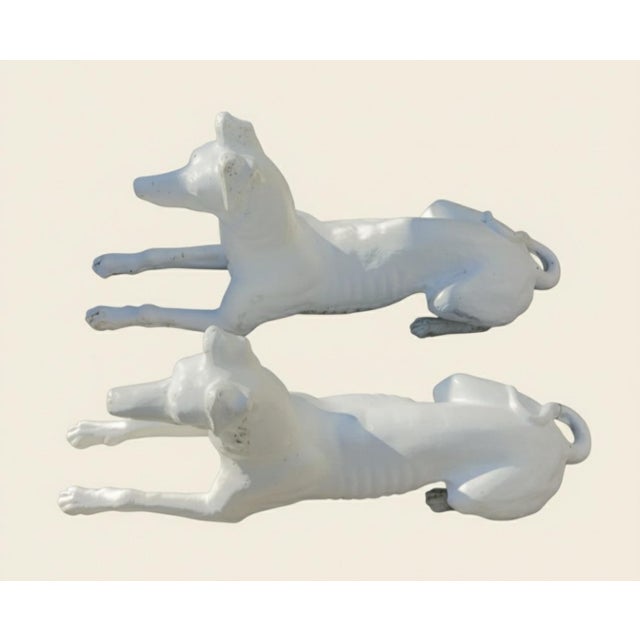 This stunning matching pair of vintage greyhound sculptures captures the grace and athleticism of the breed, believed to...