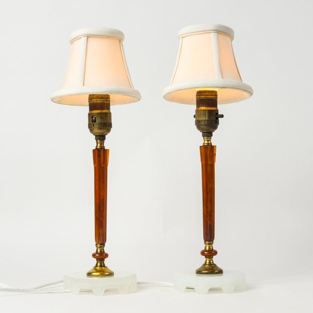 Beautiful pair of small fluted antique bakelite lamps in classically art deco style circa 1920-1930's. Base is a white...