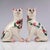Boldly modelled in an alert seated posture, this pair of ceramic mantel cats displays the characterful folk charm...