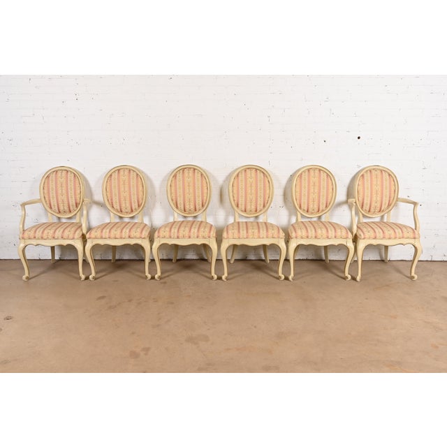 A gorgeous set of six French Provincial Louis XV style dining chairs By Karges Furniture USA, Circa 1960s Beautiful carved...