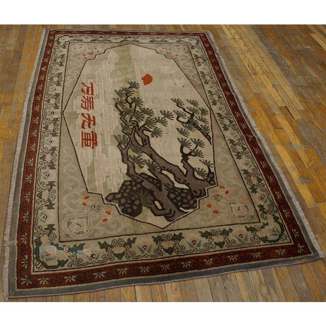Antique Chinese Khotan rug, size: 4'2" x 6'8". Antique Khotan East Turkestan Scenic Allover Knotted Rug, Circa Date:...