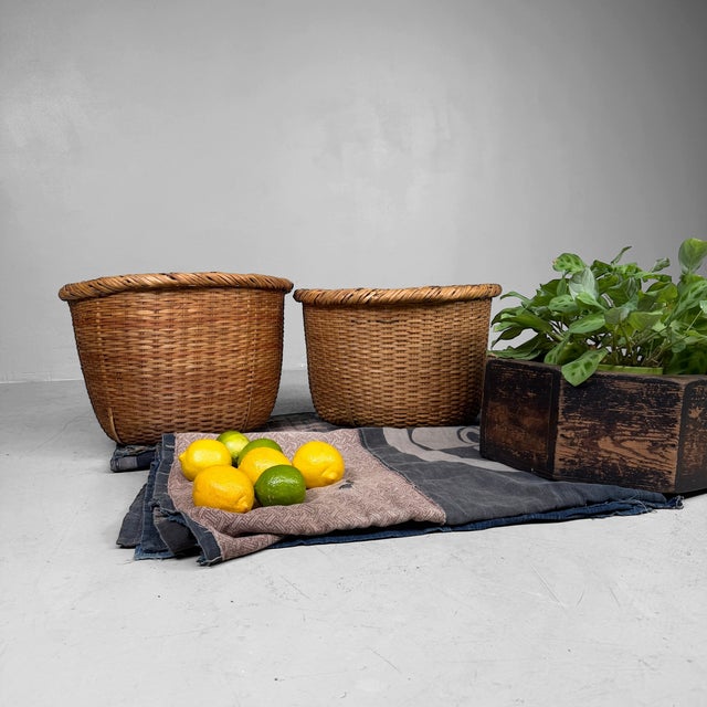 Set of two Japanese bamboo baskets, probably dating from circa 1950–1960, Shōwa period, Japan. Both baskets are handwoven...