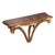 This is an elegant decorative wall bracket featuring a shaped faux tortoiseshell top with geometric brass string inlay,...