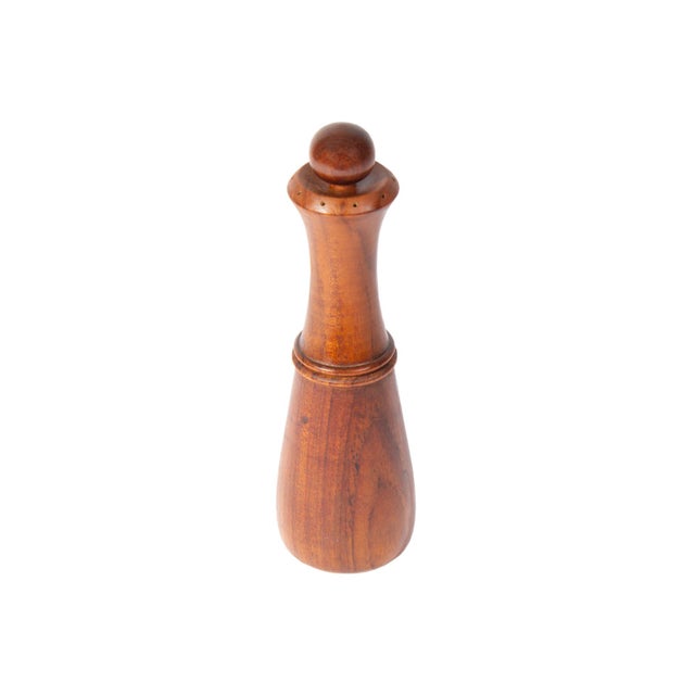 A 1960s or 70s pepper mill designed by the Danish designer Jens Quistgaard (1919-2008) for Dansk. Made of teak, this...