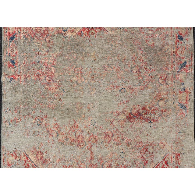 Keivan Woven Arts Distressed and rustic looking antique Persian Mahal rug with red, cream and navy blue accents. Keivan...