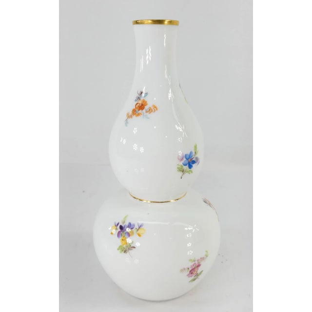 We are selling this finely painted Meissen porcelain vase of double Gourd Shape. The double gourd shape was a famous shape...