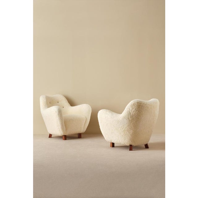 Reupholstred in white sheepskin, excellent condtition. Produced by Sten Wicéns Möbelfabrik, Sweden, 1950s. This piece is...