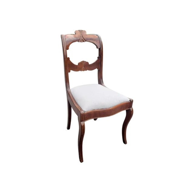 A late 19th Century Flame Mahogany and Satinwood Inlaid with Upholstered Seat Side Chair. Measures 17.5" in width, 20" in...