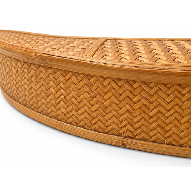 This is an attractive vintage-style woven bamboo/rattan mirror, with a beautifully detailed herringbone weave and warm...