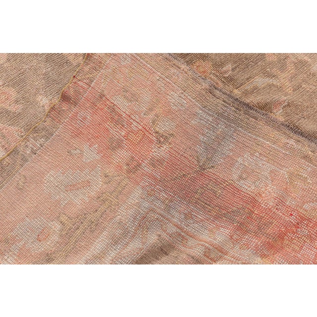 This exquisite antique Turkish Oushak rug exemplifies the refined artistry and understated elegance that have made Oushak...