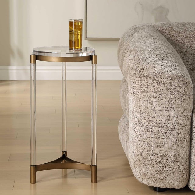 This Stylish Accent Table Features A Bronze-finished Iron Frame, Complemented By Three Clear Acrylic Legs And A...