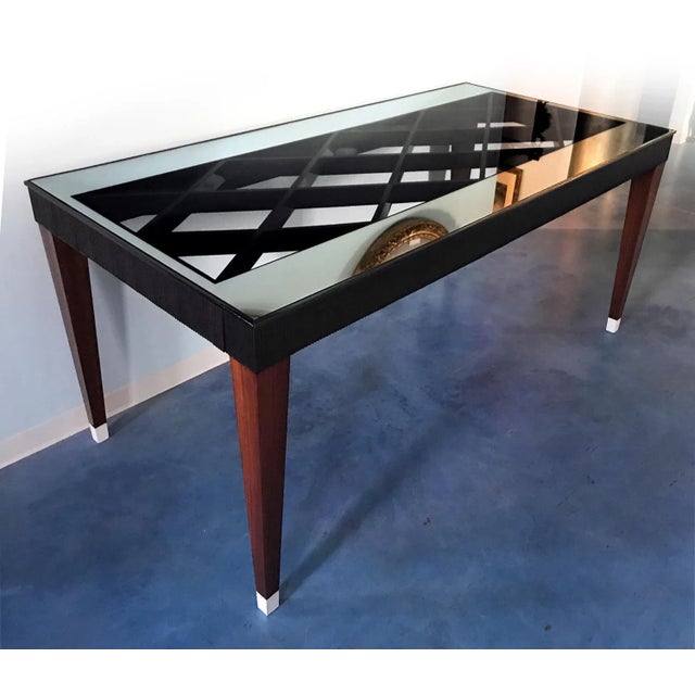 The design of this marvellous dining Table is attributed to Paolo Buffa in the 1950s. It has a unique sculptured design,...