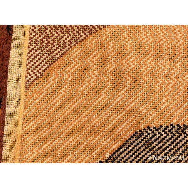 Simple crescent motifs rendered in contrasting colorways create a sleek contemporary design statement in this stylish...