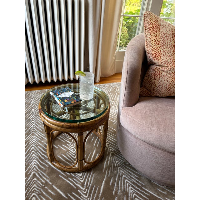 A sturdy perch for a cold drink or a potted plant. This mid-century bamboo table brings a breezy touch of the tropics to...