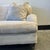 Ralph Lauren Roll Arm Sofa with Turned Brass Casters. Kiln-dried Hardwood Frame. 8-way hard tied springs. Down blend seat...