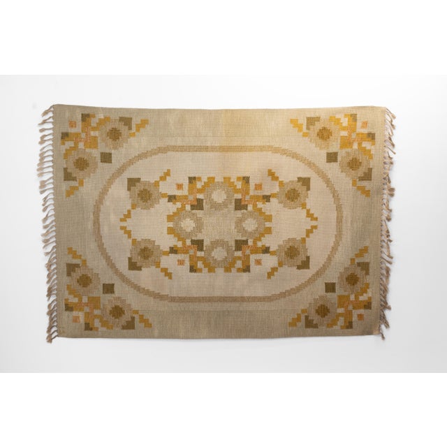 Large vintage Swedish kilim by Ingegerd Silow in earthy tones and geometric design. Signed. Circa 1960. Some colour run as...