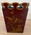 Golfar and Hughes Handpainted Tole wastebin. Deep burgundy with gilded accents and Chinoiserie design of flora and fauna...
