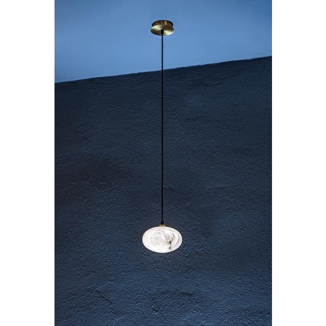 Set of 12 oval pendant lamps by united alabaster dimensions: 12x ⌀ 18 x h 12 cm materials: alabaster, copper (matt black...