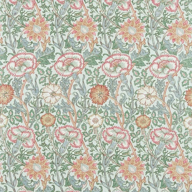Curvaceous and entwined this floral trailing fabric was designed by William Morris in 1890 and originally a large-scale...