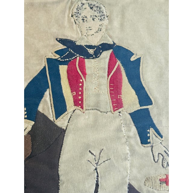 A striking hand-stitched textile portrait depicting an 18th century French Revolutionary or early Napoleonic officer. This...