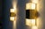 Elegant and rare pair of glass wall sconces by Jean Perzel. Designed and crafted in France, these timeless pieces embody...