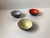 A palet of 3 vintage enameled steel and Eternit Krenit bowls. Designed by Herbert Krenchel and manufatured by Torben...