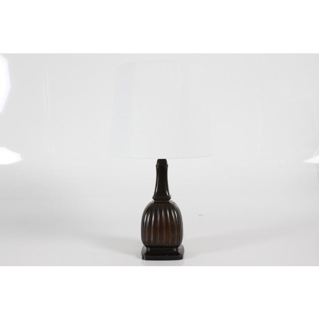 Danish Art Deco table lamp from Just Andersen (1884-1943) made in the 1930s. It is in very good vintage condition showing...