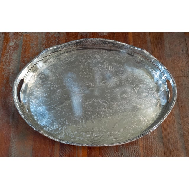 We are selling this decorative English Sheffield silverplate tray with gallery. This tray is perfect for a bar or on a...