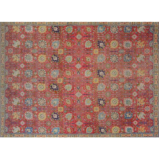 An incredible mid-20th century Persian Tabriz with an outstanding trellis floral and scrolling vine pattern woven in...