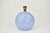 Stunning and rare ceramic table lamp. The base has a lilac / lavender colored glaze with a quilted pattern, and circles on...