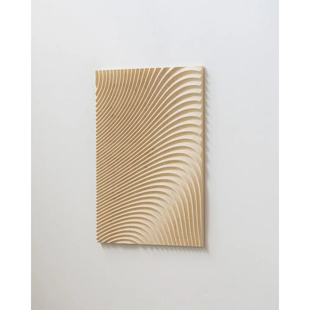 “Wave”, a natural coloured carved wood wall sculpture by Amsterdam based designer Arno Hoogland. Signed by Maker