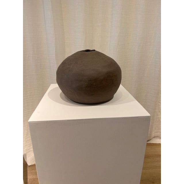 Dimensions: 8.5” w x 11”d x 9”h Material: stoneware Finishing: unglazed Color: mushroom Edition: one-of-a-kind