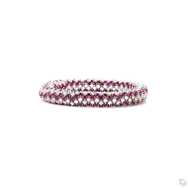 This bracelet from our contemporary estate collection centers on a 14.37-carat diamond in an old mine cut, a cushion-...
