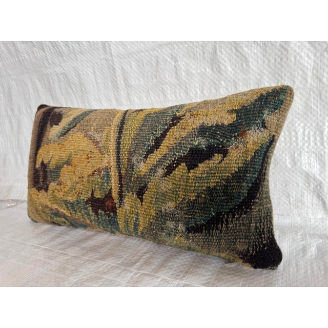 This authentic 17th century Flemish tapestry pillow is crafted from a fragment of an original verdure tapestry, hand woven...