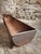 This antique French cast iron trough dates from the 19th century and originates from a rural farm setting. The piece...