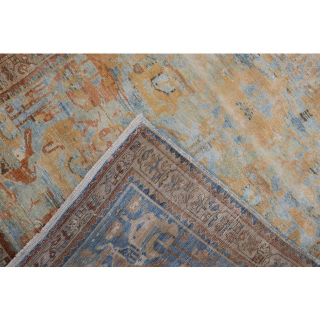 Lovely Persian throw scatter size rug with a sky blue field, the main accent color is in peach, circa 1940. Measures: 3'5"...