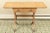 Regency style drop leaf side accent table on casters with two drawers, straight stretcher, brass pulls and toe caps....