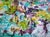 This vibrant work presents a bucolic landscape where nature flourishes in a symphony of vivid colors. The artist seeks to...