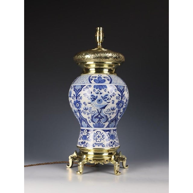 Late victorian belgian blue & white faience oil lamp, circa 1880–1900 a beautiful late victorian blue and white faience...