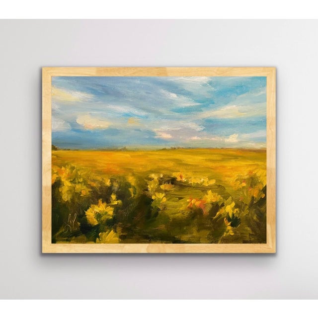 Song of Gold captures a vibrant landscape drenched in golden hues, where fields of flowers stretch toward a softly...