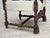 1950s, Danish highback armchair. Reupholstered by craftsman in genuine cowhide. Carved oak wood, brass springs in the...